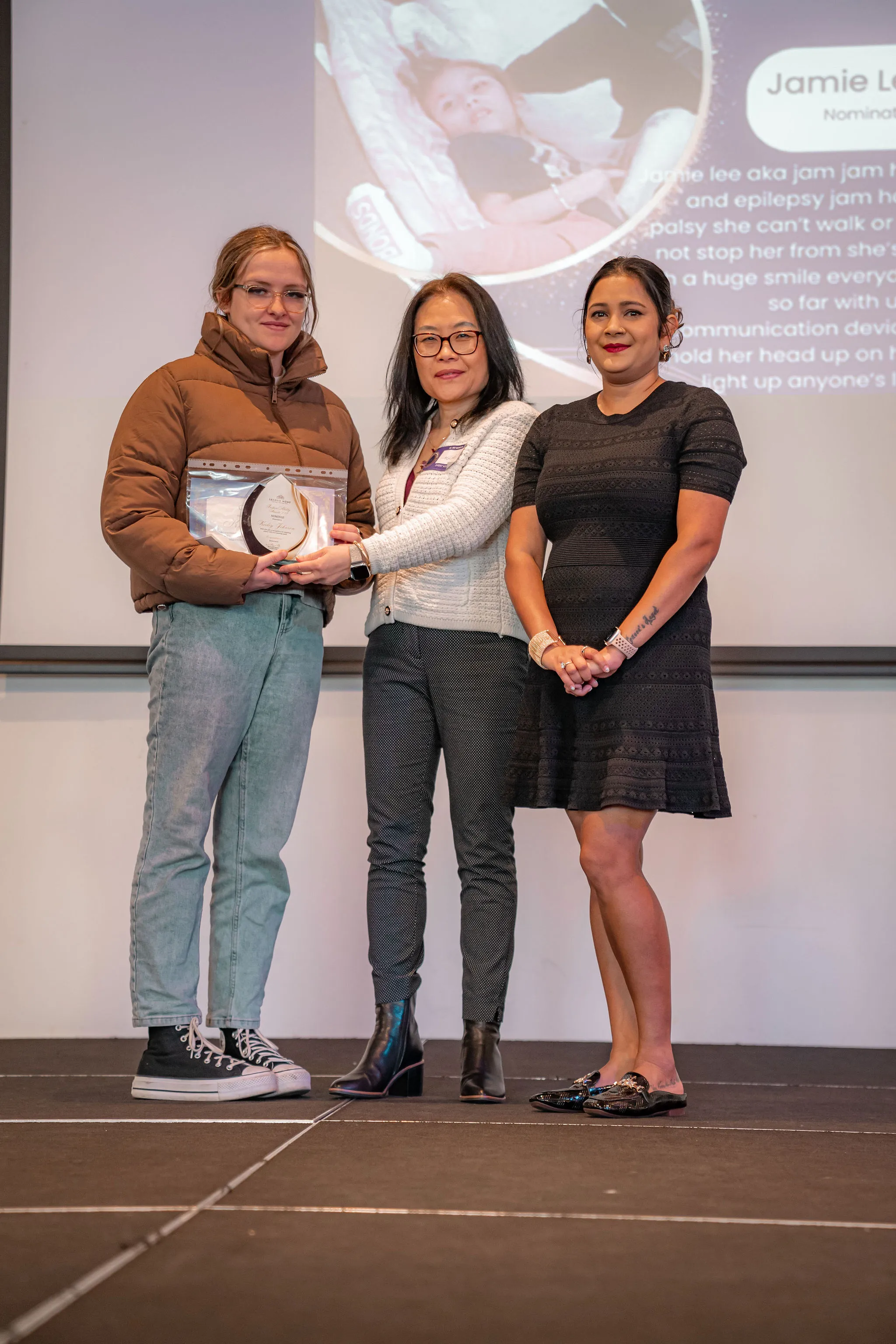 A participant receiving an Inspireability award.